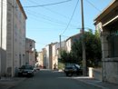 La rue principale de Saint-Jean-du-Barrou : nombreux rseaux ariens
