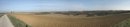 Sommets aplanis et cultivs, crtes boises  l'horizon ; vue depuis la route-paysage sur une crte au-dessus de Payra-sur-l'Hers