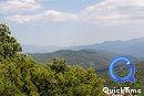  Vue panoramique sur le massif des Aspres depuis le col Xatard : les pentes boises et les sommets dgags pturs