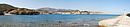 Le port de Port-Vendres depuis la jete : les falaises de schistes et le port dans le fond de la baie