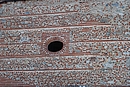 Dtail d'architecture : mur en galet altern de lignes de cairo (la brique locale) et piquet d'clat de brique ; ici au Soler
